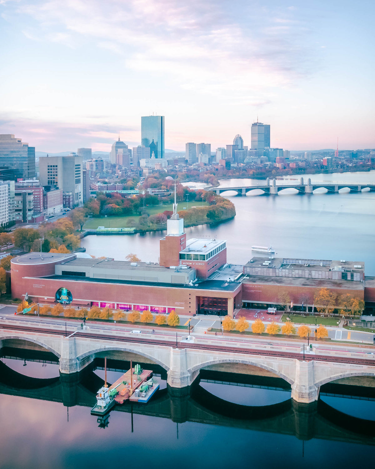 VIEW OF BOSTON FROM THE MUSEUM OF SCIENCE DURING FOLIAGE